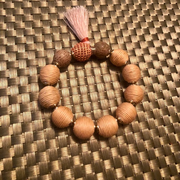 Beautiful beaded peach neutral bracelet with tassel - Picture 2 of 4